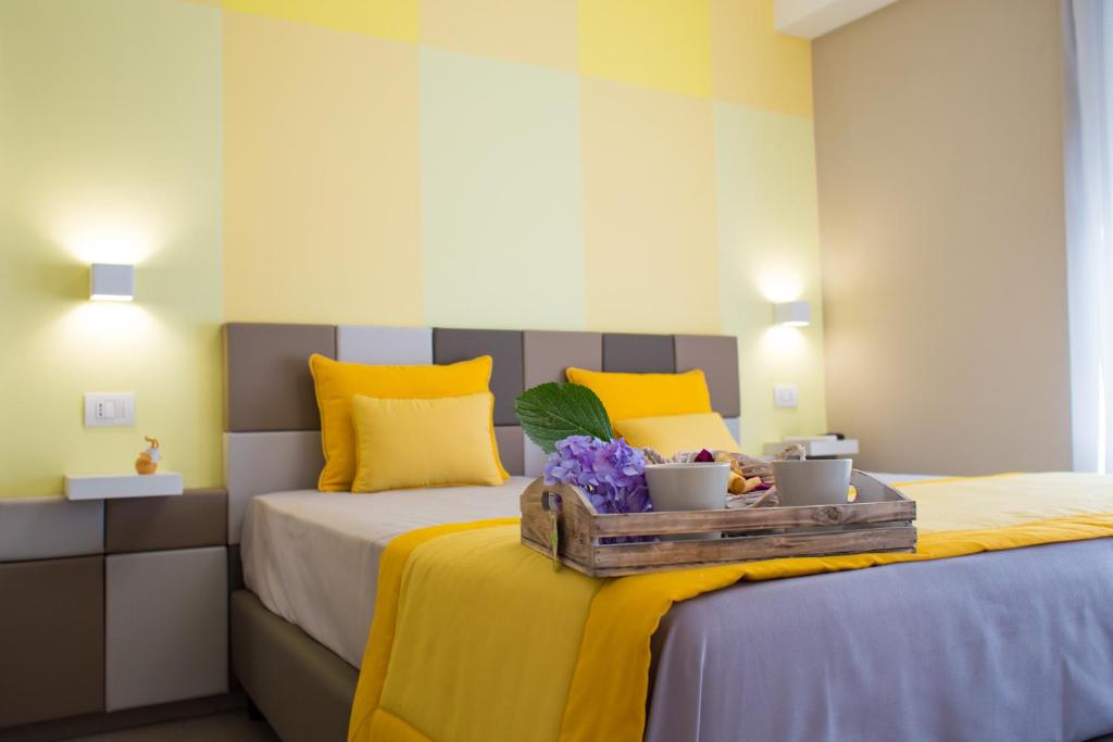 Postel nebo postele na pokoji v ubytování Relais del Corso