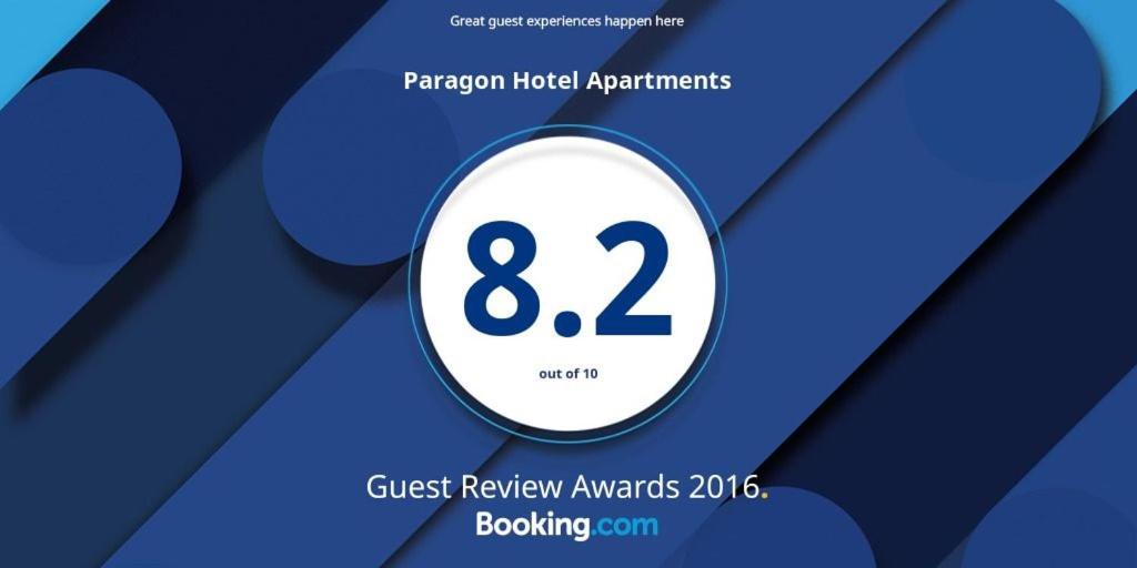 a sign with the number eight on a blue background at Paragon Hotel Apartments in Abu Dhabi