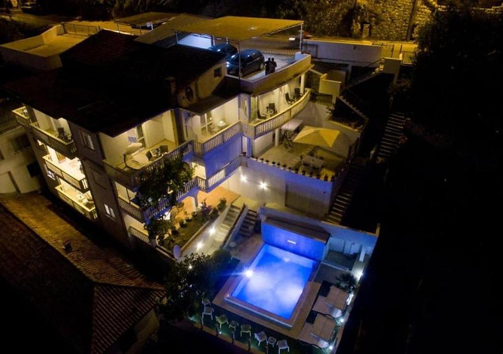 an overhead view of a large house with a pool at Apartments Mar in Ulcinj