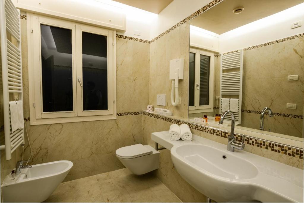 Koupelna v ubytování Royal San Marco Hotel