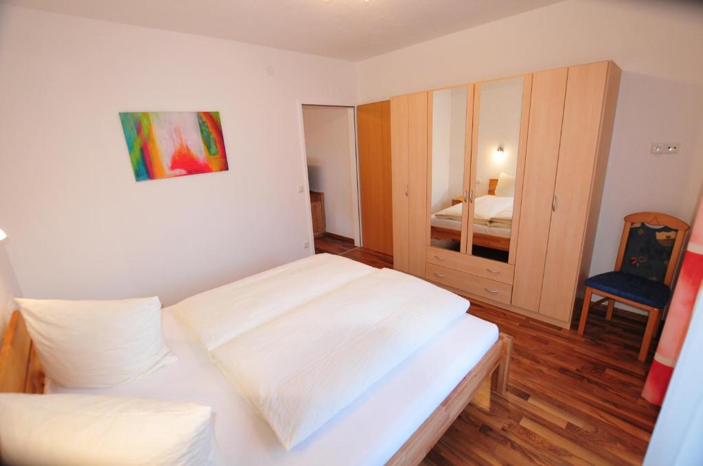 Postel nebo postele na pokoji v ubytování Haus Scheiber
