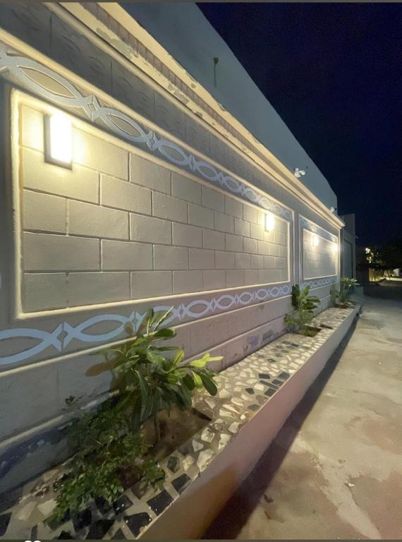 a building with plants on the side of it at Aean partmrnt in Jeddah