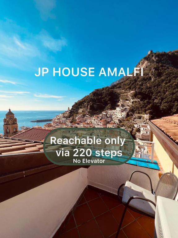 a balcony with a view of a mountain at JP House Amalfi in Amalfi