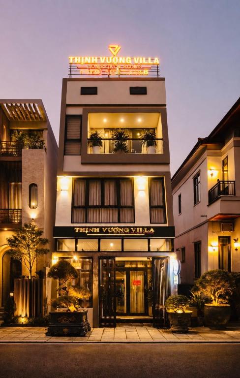 a building with a sign that reads future wolves will at Thịnh Vượng Villa in Dong Hoi