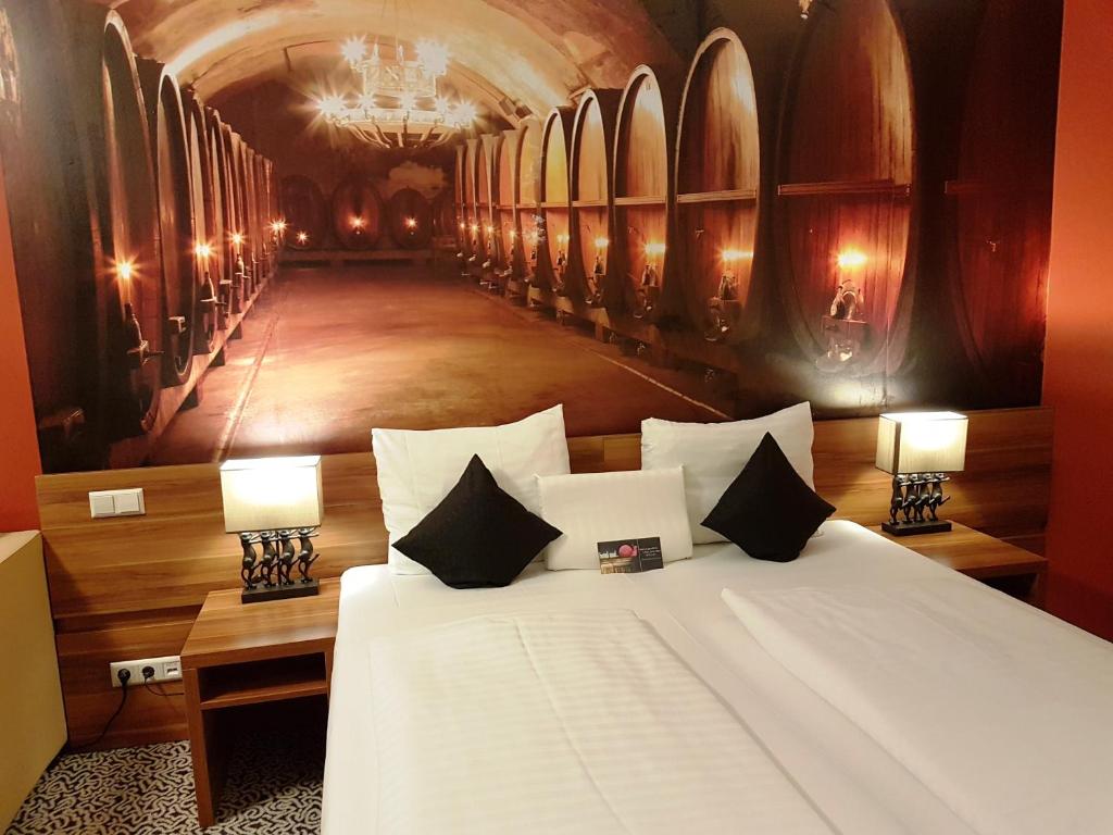 Voodi või voodid majutusasutuse Hotel Süd Graz toas