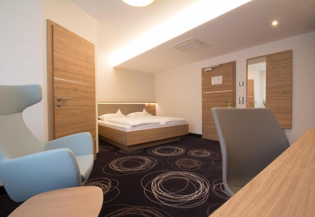 Voodi või voodid majutusasutuse Hotel Rio toas
