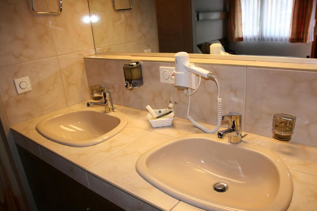 Koupelna v ubytování Hotel Glärnisch Hof