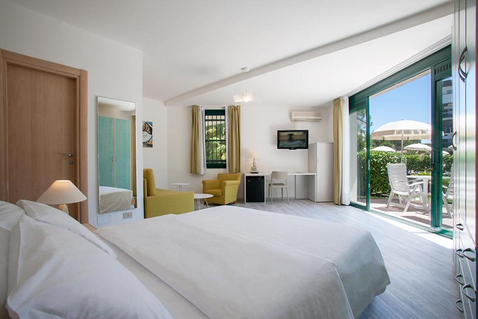 Кровать или кровати в номере Hotel Delle Nazioni