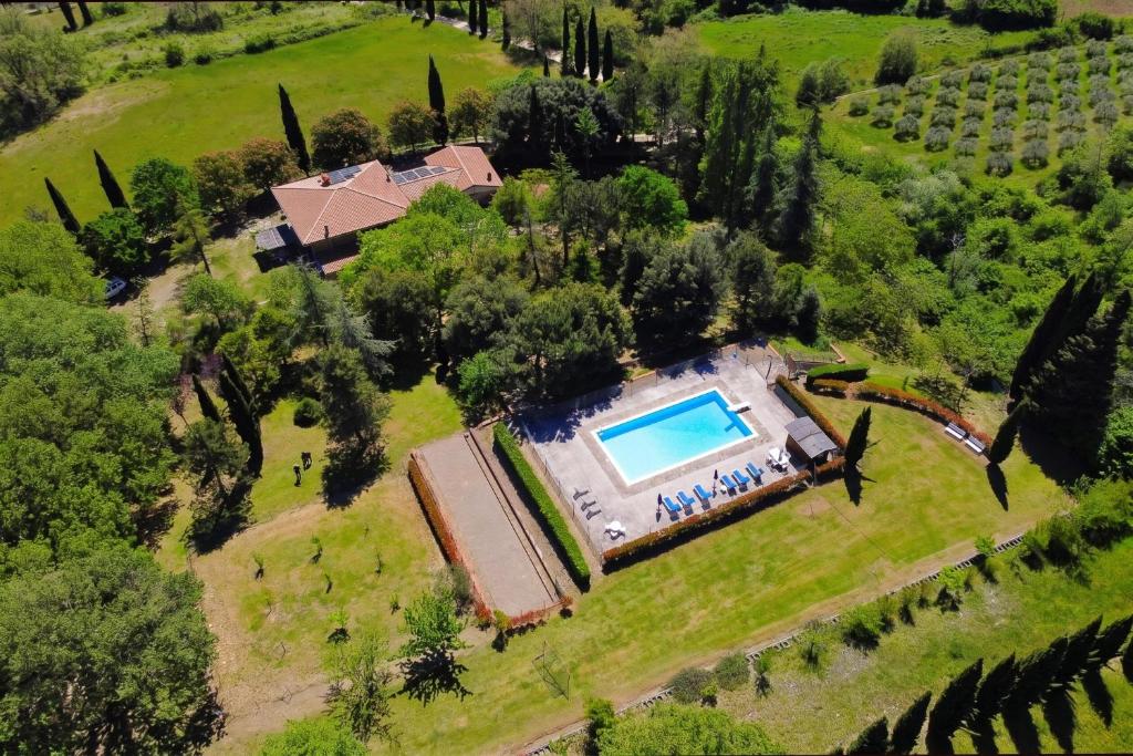 Swimmingpoolen hos eller tæt på Casale Tigli - Happy Rentals