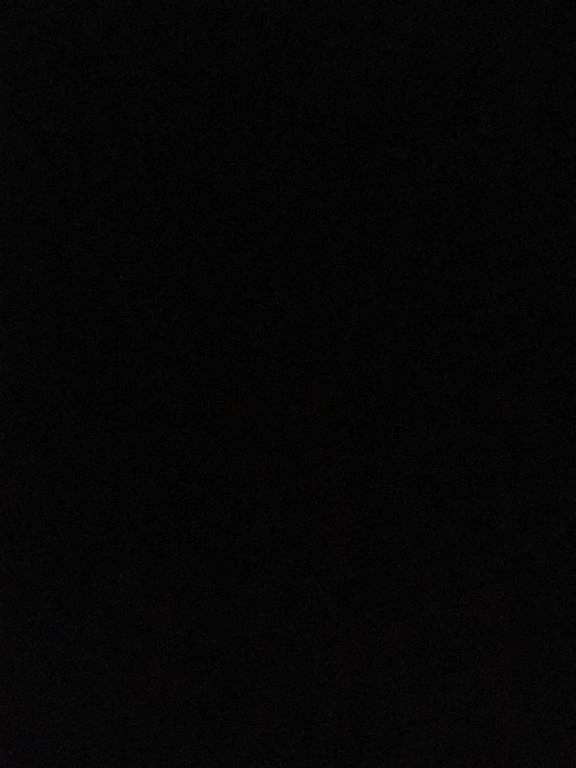 a dark room with a black background at Casa sendero in Matamoros