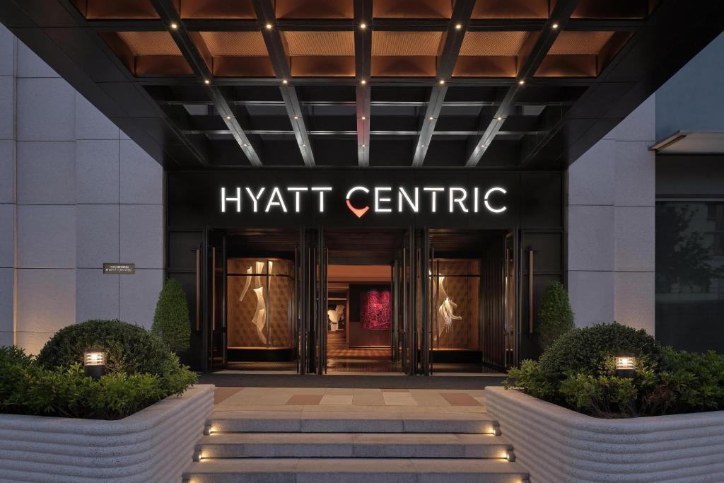 a view of the entrance to the hyatt centric building at Hyatt Centric Zhongshan Park Shanghai in Shanghai