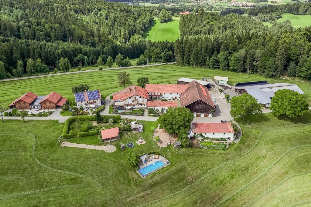 an aerial view of a house in a field at Dienberger Ferienhaus in Untergriesbach