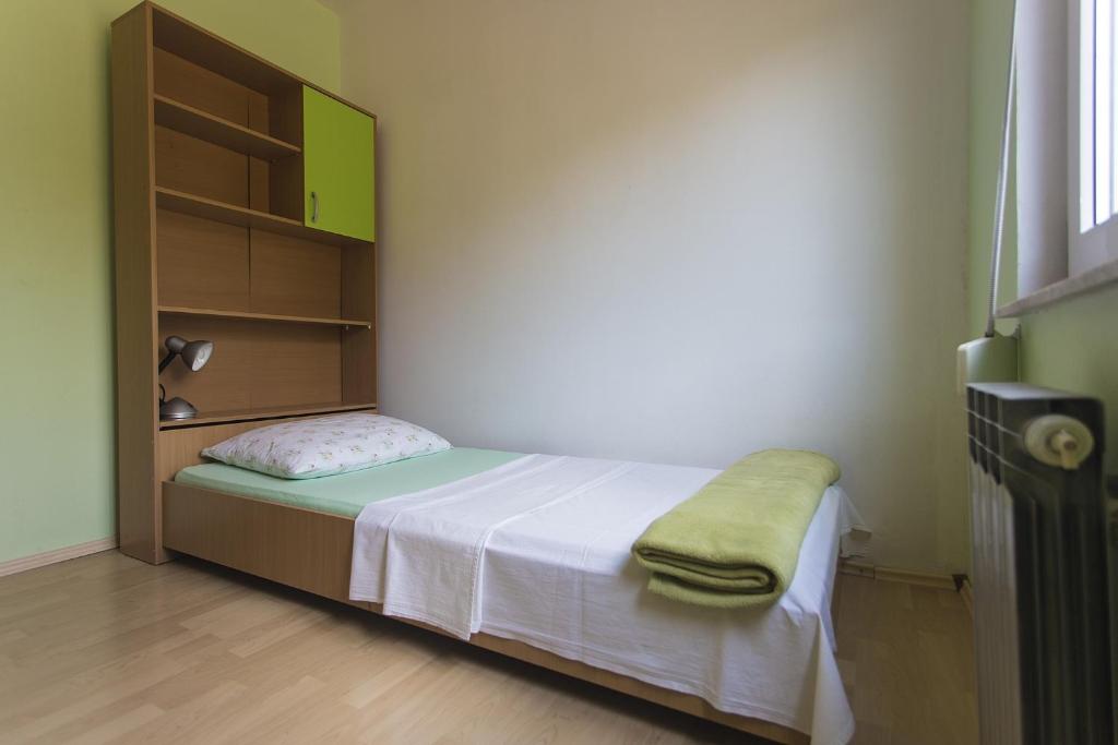 Posteľ alebo postele v izbe v ubytovaní Gospodar Apartments