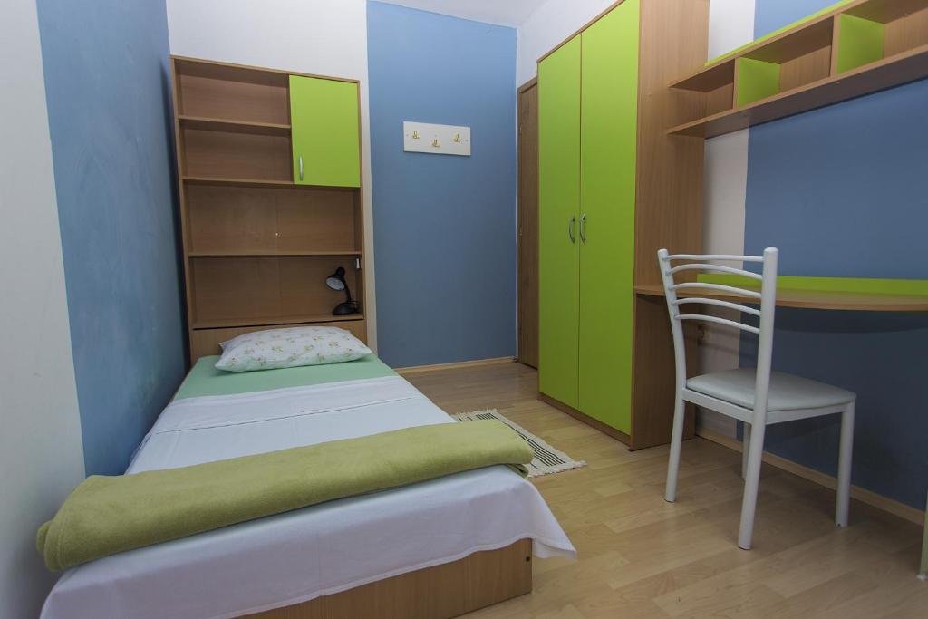Posteľ alebo postele v izbe v ubytovaní Gospodar Apartments