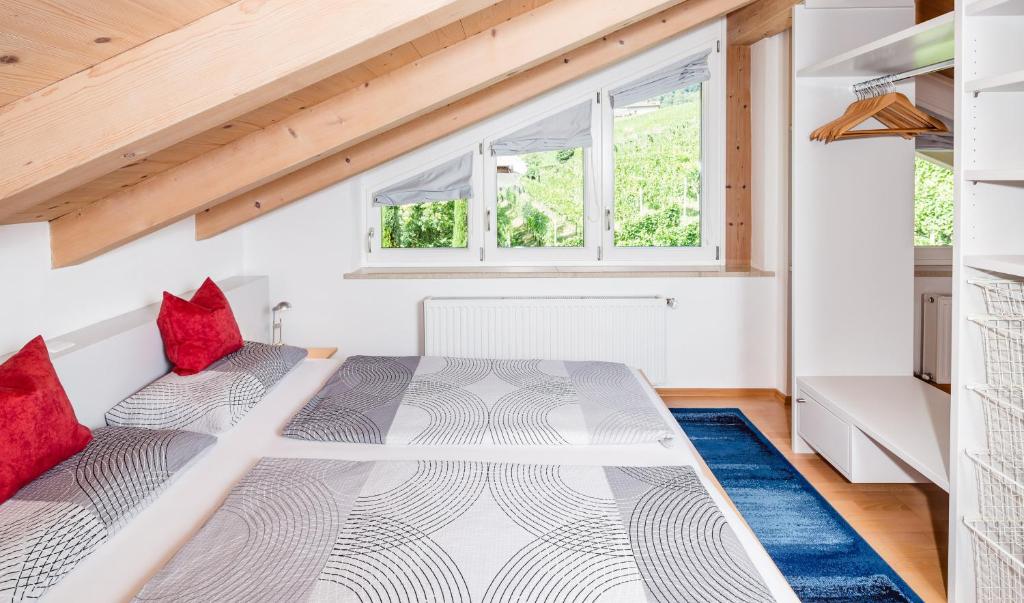 Postel nebo postele na pokoji v ubytování Haus Sauvignon