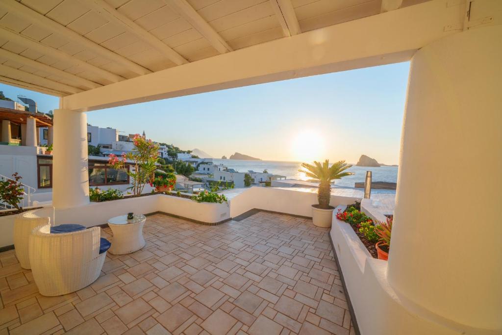 a balcony with a view of the ocean at Hotel La Terrazza in Panarea