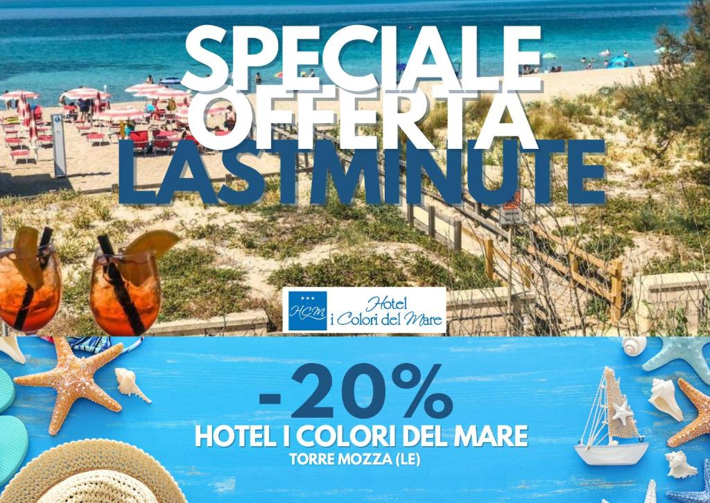 a poster of a beach with a sign for a resort at Hotel I Colori Del Mare in Torre Mozza
