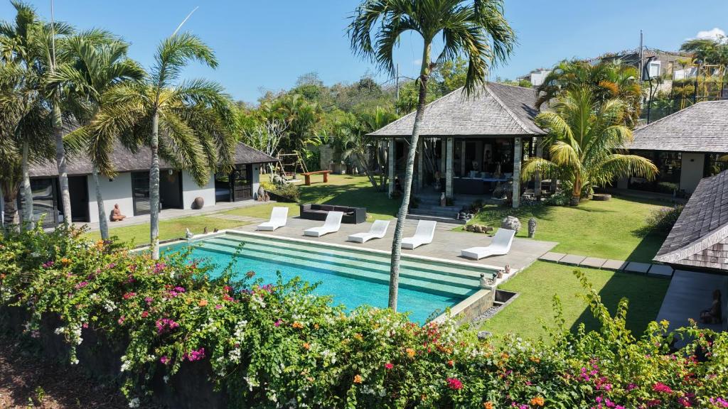 an aerial view of a resort with a swimming pool at Life is One in Uluwatu