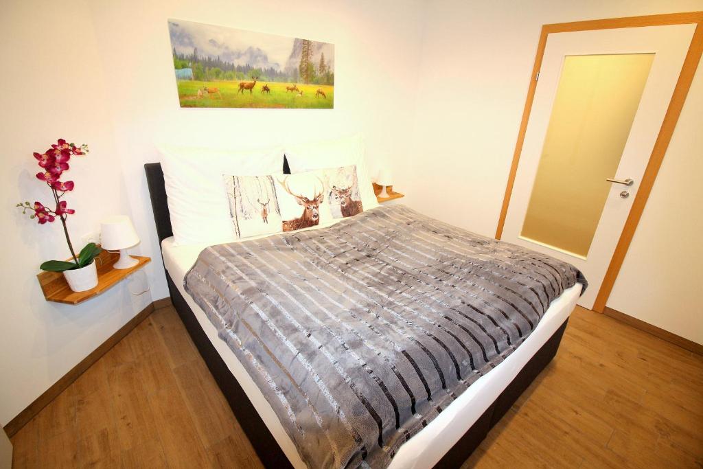 Ein Bett oder Betten in einem Zimmer der Unterkunft Appartement Prielau