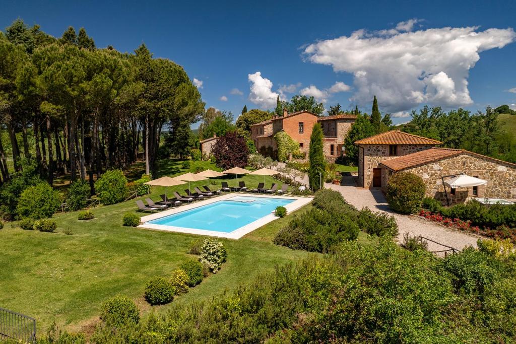 an aerial view of a villa with a swimming pool at PODERE BELLARIA 18&2, Emma Villas in Rapolano Terme
