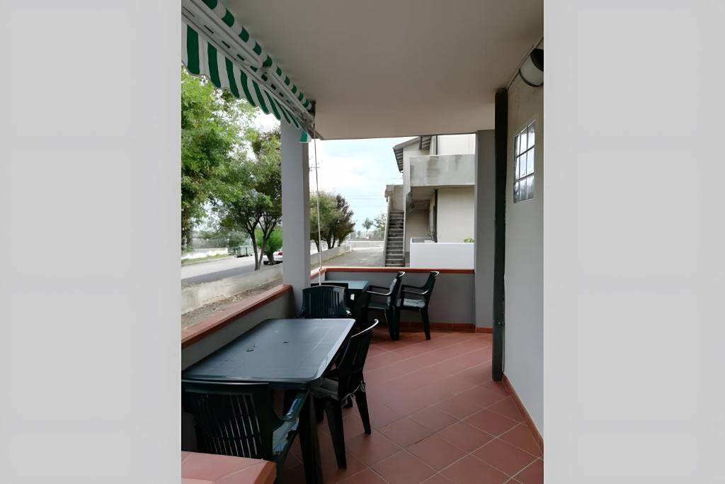 a view of a patio with tables and chairs at Casa al Mare Ingresso Indipendente in Casalbordino