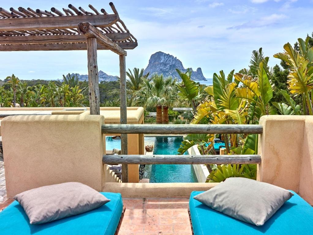 a view of the pool from the balcony of a resort at Kasbah 2 in Sant Josep de sa Talaia