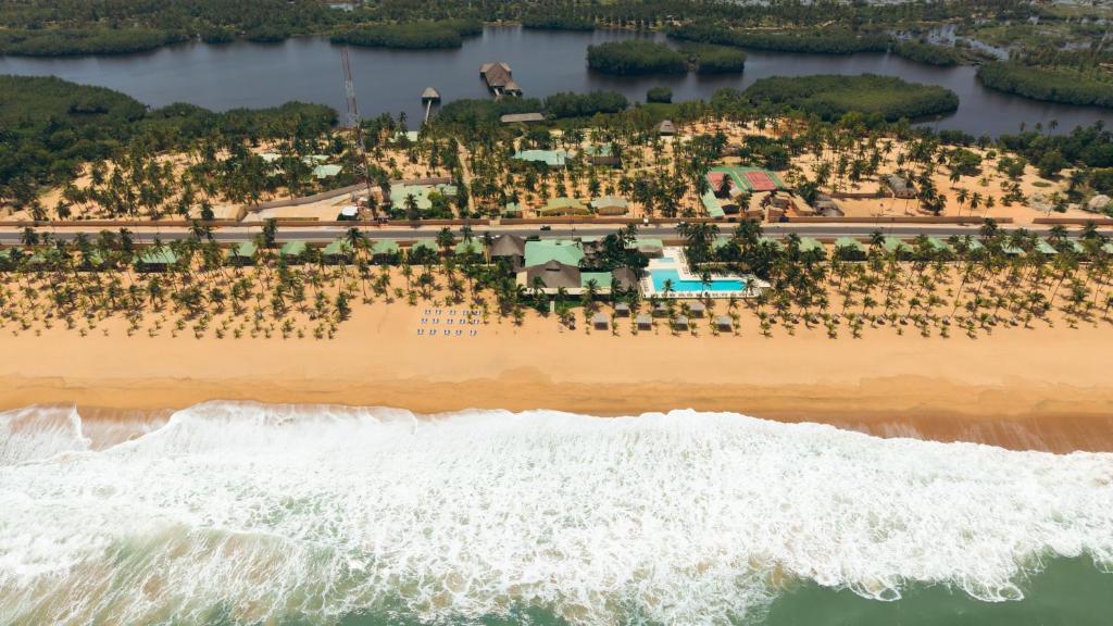 an aerial view of a resort on the beach at Casa Del Papa Resort in Ouidah