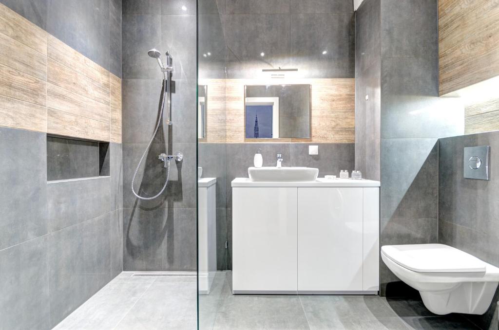 Kúpeľňa v ubytovaní Apartments Brabank Old Town & by Noclegi Renters