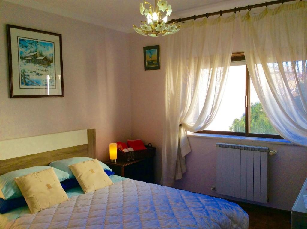 Postel nebo postele na pokoji v ubytování Villa da Melis