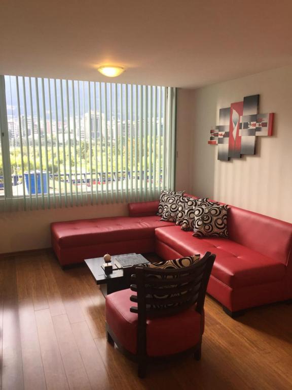 Posezení v ubytování Misuitehotel La Carolina Quito