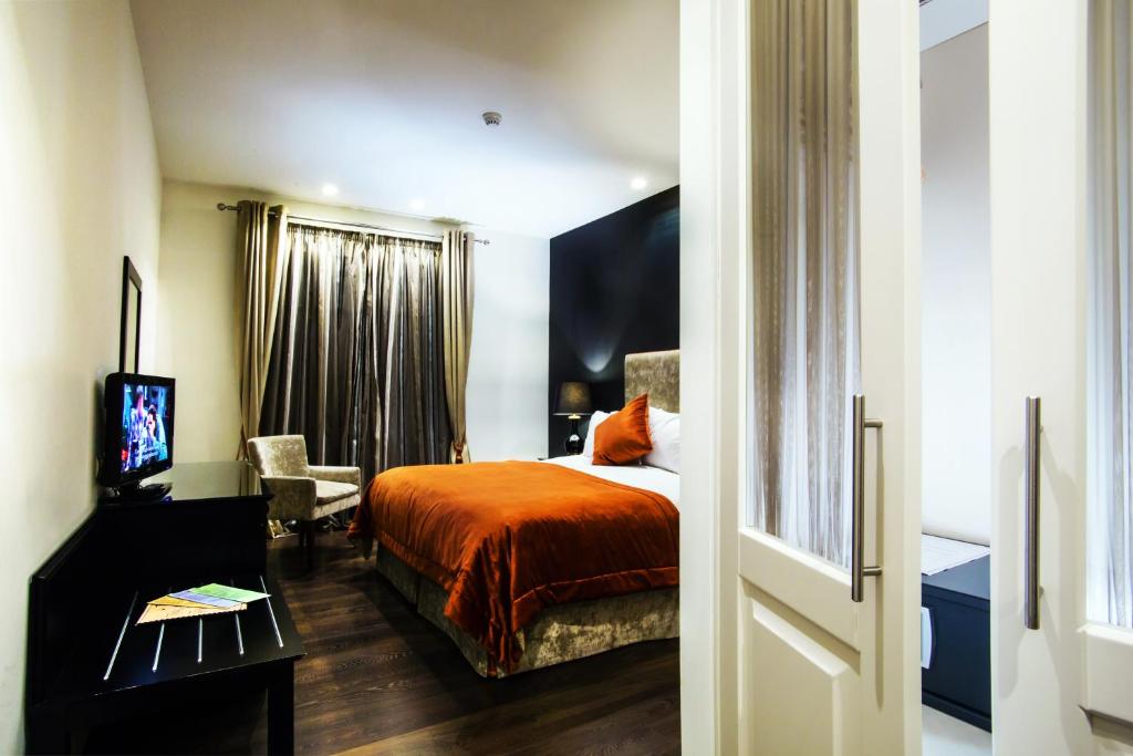 Postel nebo postele na pokoji v ubytování Nymfasia Resort