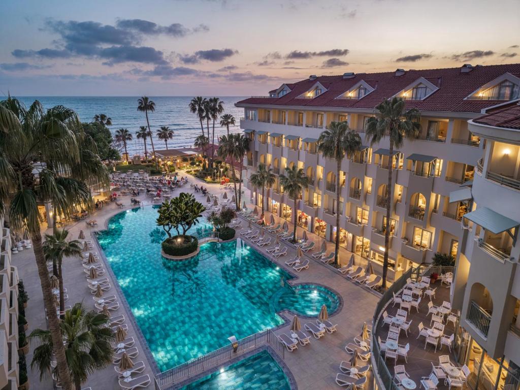 an aerial view of a hotel with a swimming pool at Side Star Beach Hotel - Ultra All Inclusive in Side