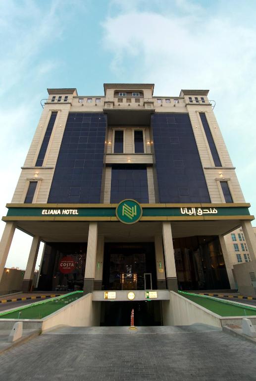 a building with a sign on the front of it at Eliana Hotel in Al Khobar