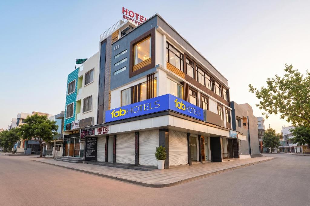 a building with a sign on the side of it at FabHotel Skyview in Bhopal