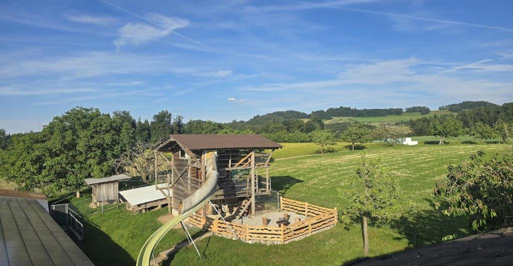 an aerial view of a playground with a slide at Mutzgraben Lodge in Seeberg