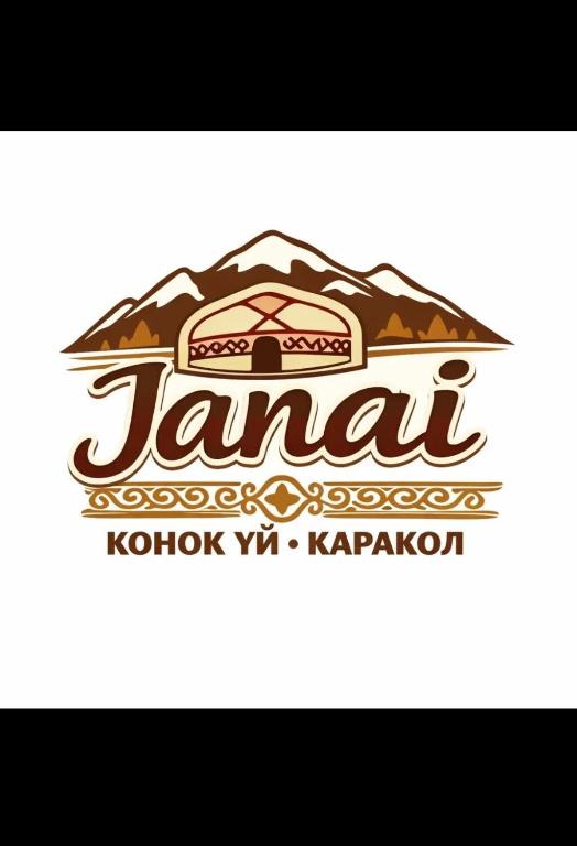 a logo for a korean restaurant with a mountain at Janai Guest house in Karakol