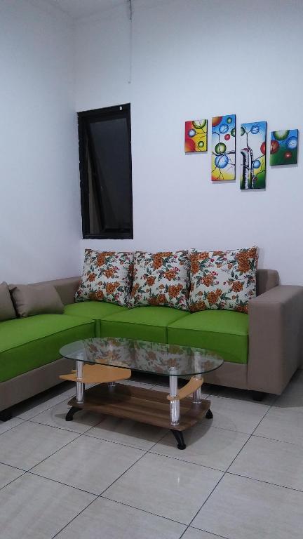 Posezení v ubytování Cozy Residence Muwardi