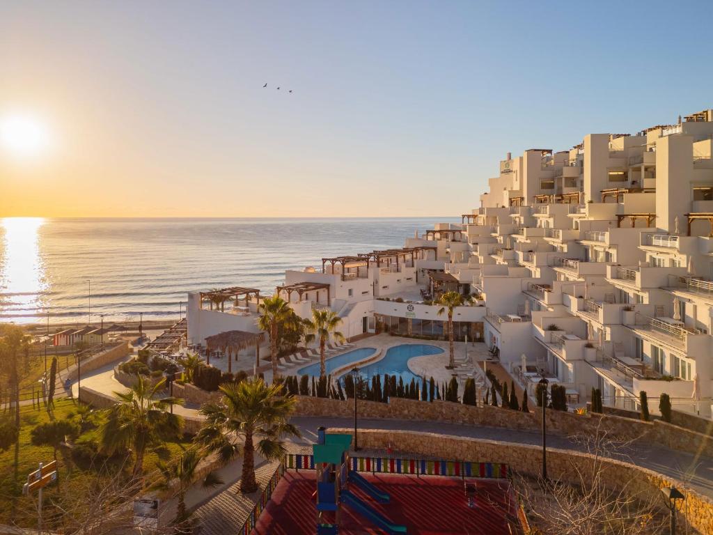 an aerial view of a hotel and the ocean at Dormio Resort Costa Blanca Beach & Spa in El Campello