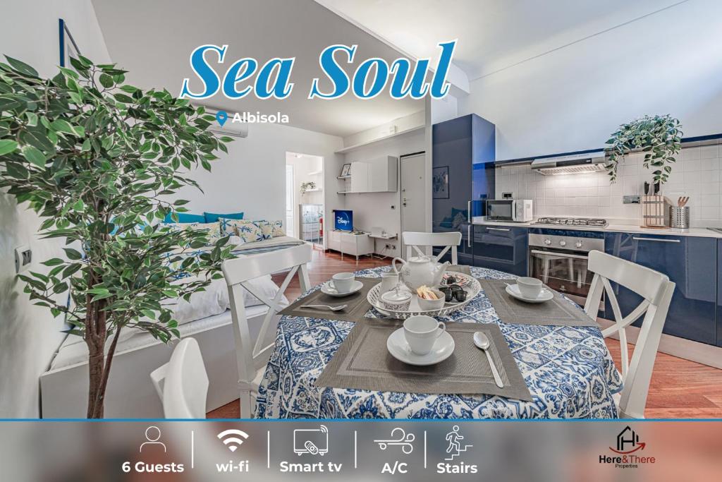 a dining room and kitchen with a table and chairs at SeaSoul - Mare 100m - 6 Guests - Centro Storico in Albissola Marina