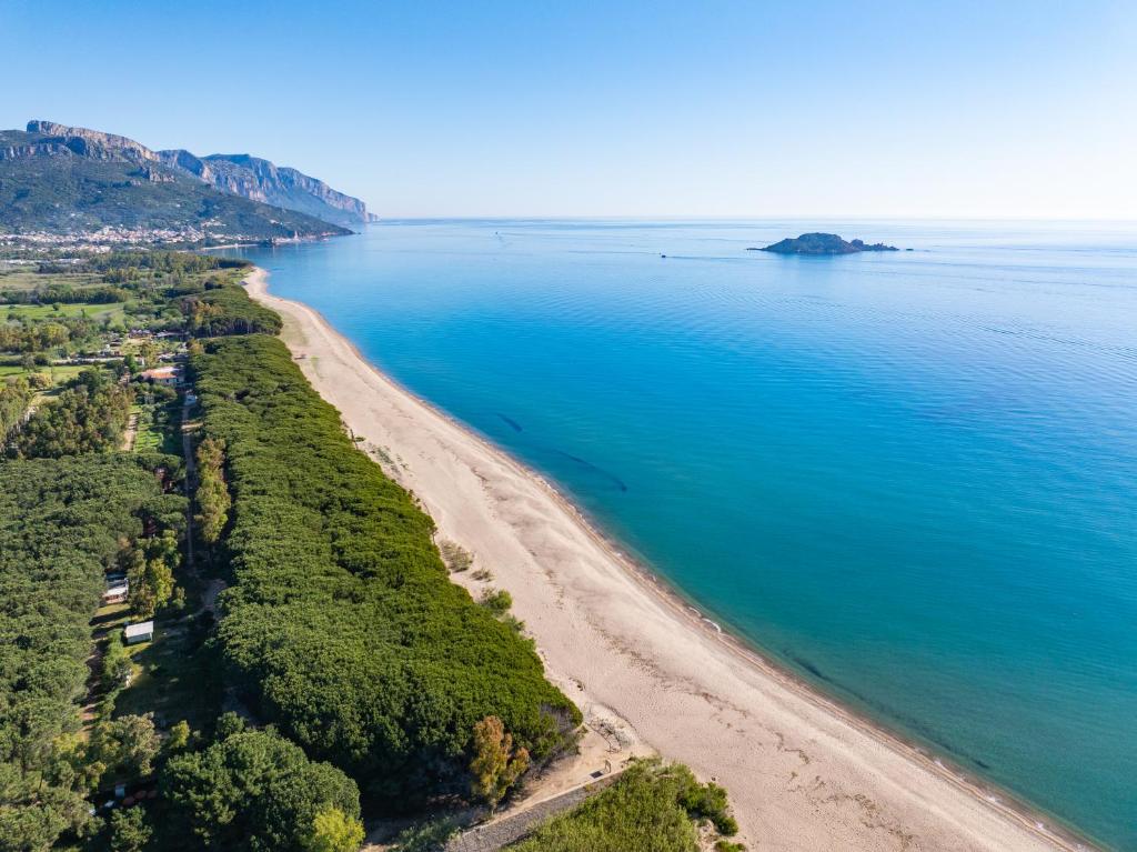 an aerial view of a beach and the ocean at Camping Iscrixedda in Lotzorai
