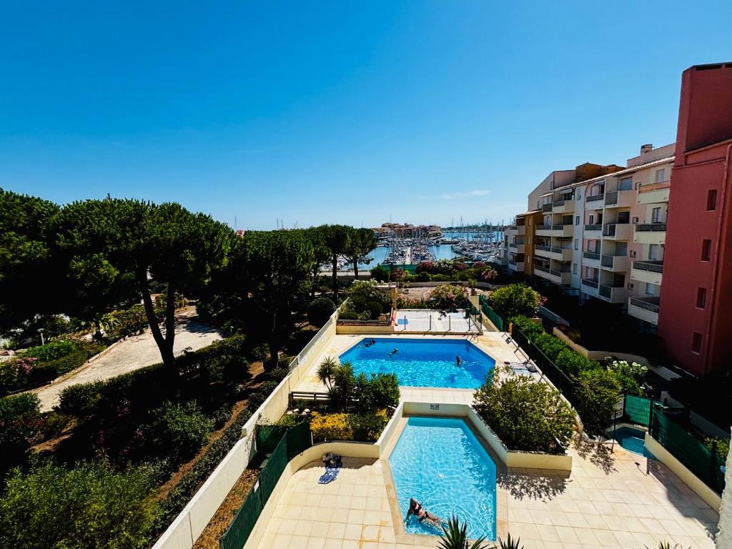 Esprit vacances,Piscine,Vue sur le Port,Parking privé,Commerces et restaurants