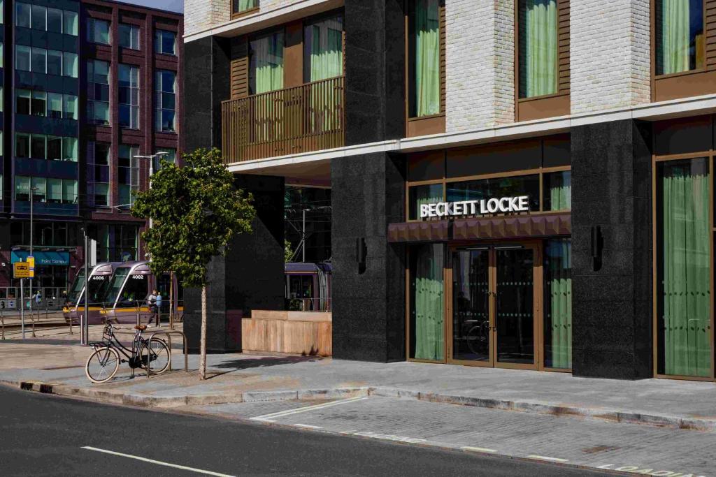 a bike parked in front of a store on a city street at Beckett Locke in Dublin