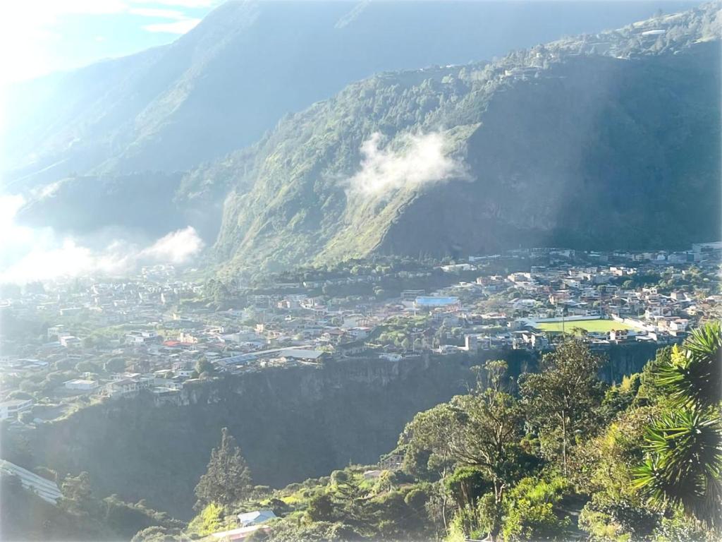 a view of a town in a mountain valley at FerG in Lligua