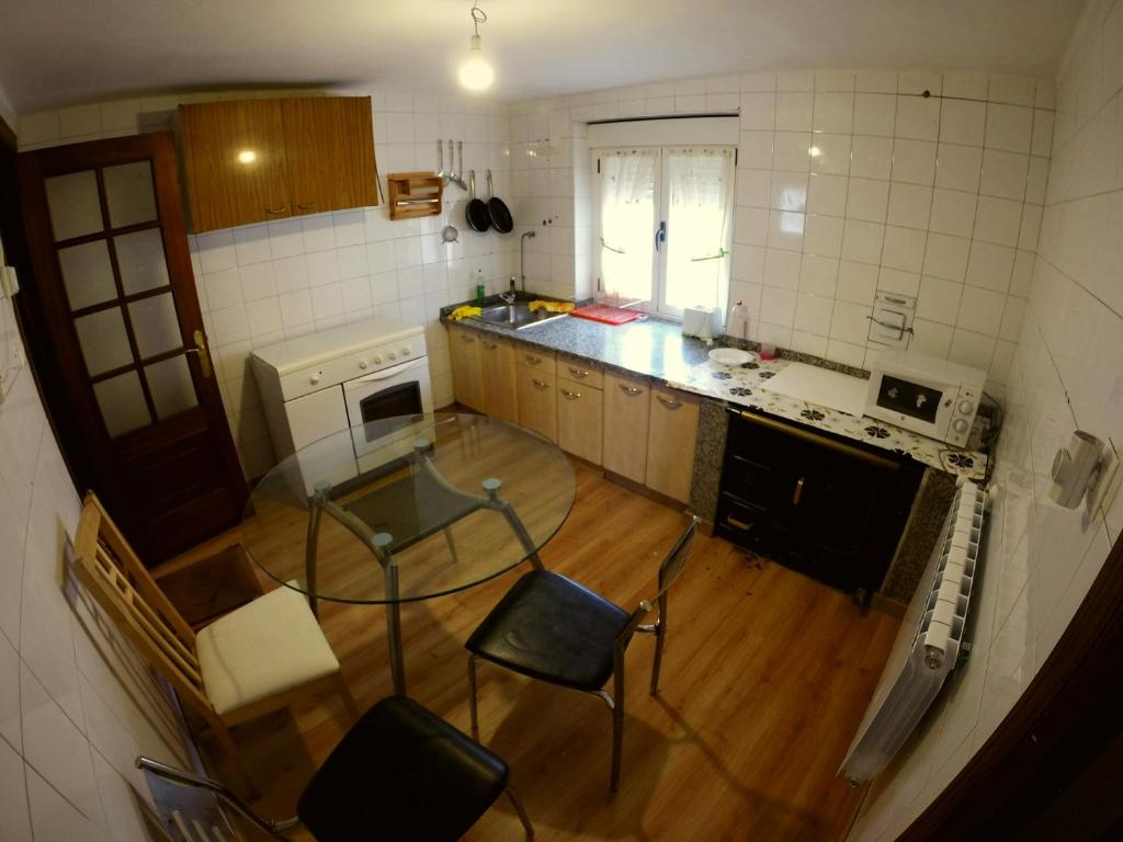 Una cocina o zona de cocina en Alojamientos turísticos VUT-LE-043