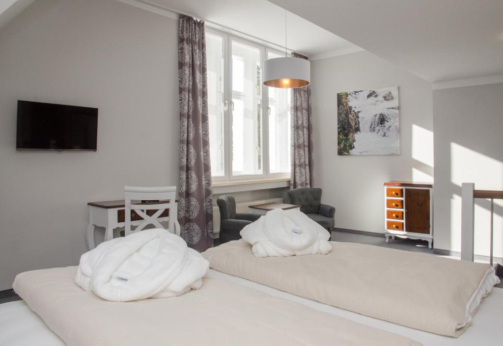 Postel nebo postele na pokoji v ubytování Villa Bergzauber