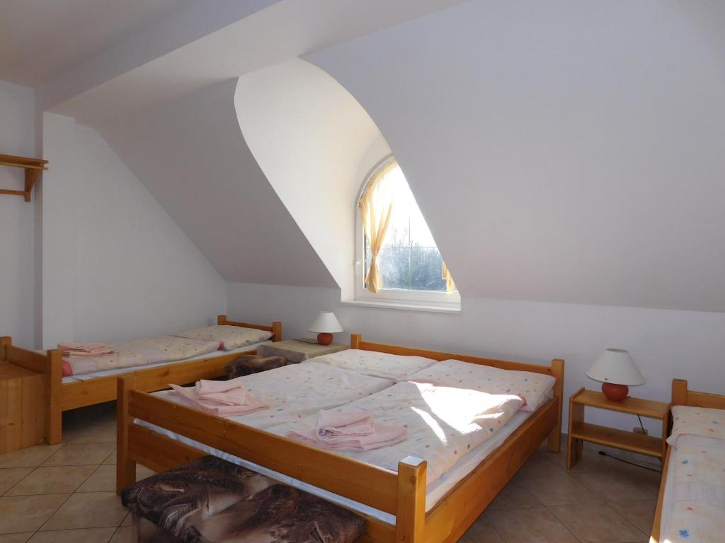 Postel nebo postele na pokoji v ubytování Penzion Petko