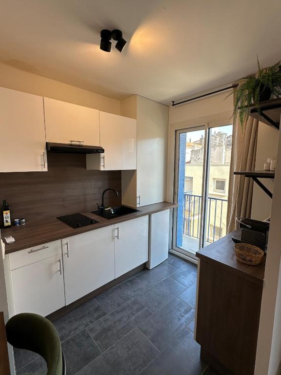 Charmant appartement climatisé en cœur de ville