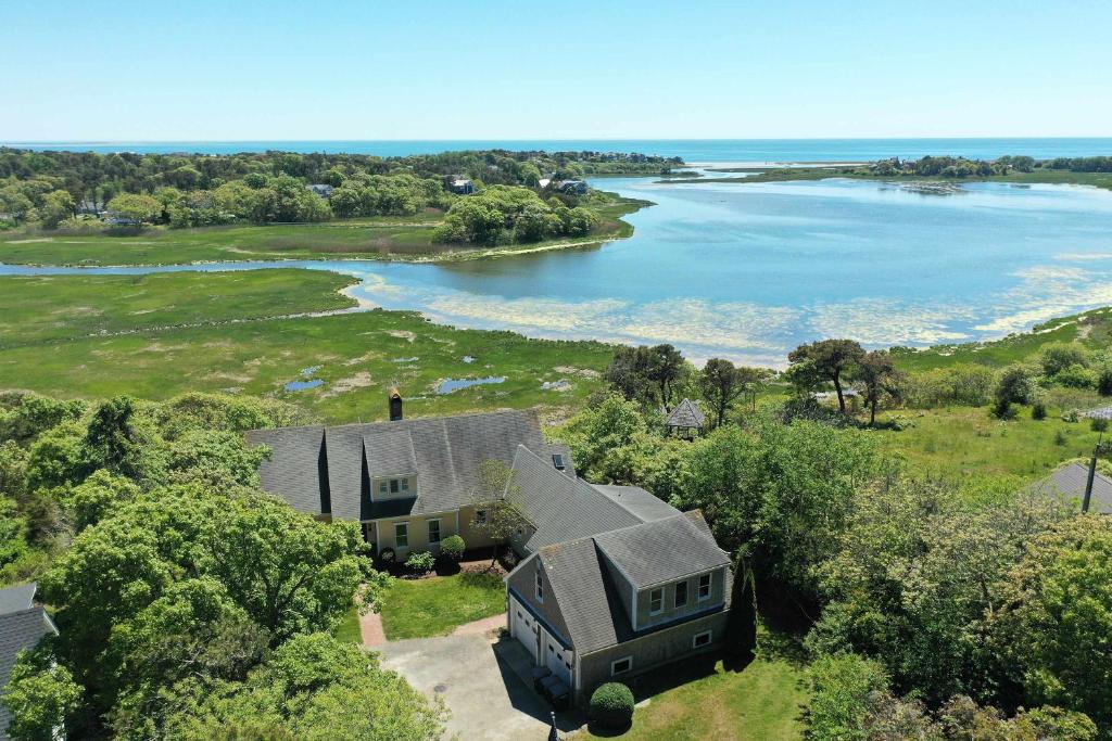 an aerial view of a house next to a lake at Waterfront Escape Game Room Dog Friendly in Chatham