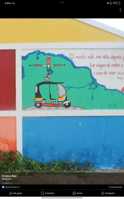 a picture of a person on a bike on a wall at Sonhos homens gake in Villa de Leyva