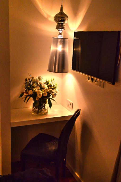 Televízia a/alebo spoločenská miestnosť v ubytovaní Atelier Zakopane Apartamenty pod Giewontem